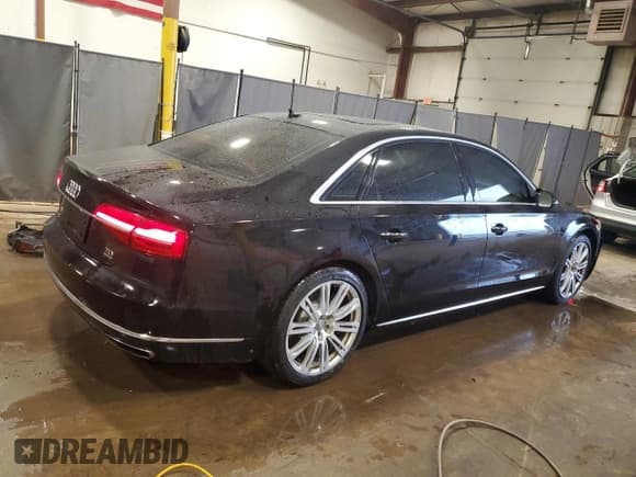 ✅ 2015 Audi A8 3.0L TDI • VIN: WAU3MAFD3FN002044 • Lot: 52869495. Listed on Copart with 129,094 mi. Free auction sales archive from the USA and detailed vehicle history report at DreamBid. Image 3.