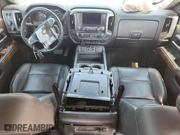 2017 Chevrolet Silverado 2500HD LTZ с VIN 1GC1KWEY4HF156440, выставлен на аукционе Copart как лот 71732905 с пробегом 180 327 миль миль и Списание • Salvage title. История ставок и продаж доступна на DreamBid. Изображение 8.