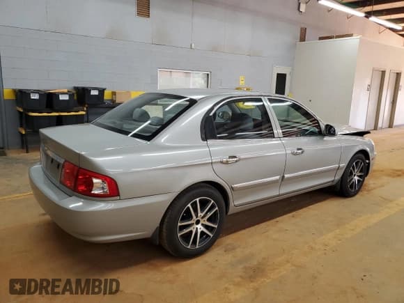 ✅ 2005 Kia Optima LX • VIN: KNAGD128455410979 • Lot: 71929355. Wystawiony na Copart z przebiegiem 219 338 mil. Bezpłatny archiwum sprzedaży aukcyjnych z USA i szczegółowy raport historii pojazdu na DreamBid. Zdjęcie 3.