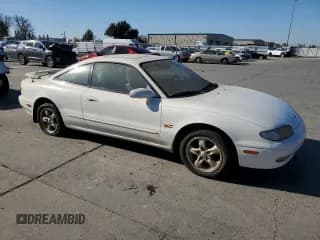 ✅ 1996 Mazda MX-6 • VIN: 1YVGE31D5T5566451 • Lot: 88347915. Wystawiony na Copart z przebiegiem 172 188 mil. Bezpłatny archiwum sprzedaży aukcyjnych z USA i szczegółowy raport historii pojazdu na DreamBid. Zdjęcie 4.