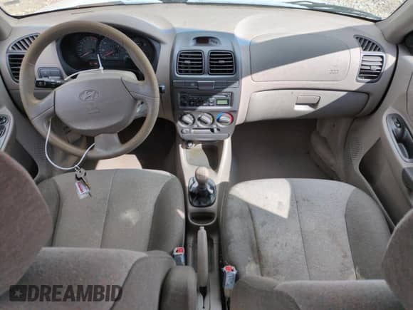 2002 Hyundai Accent GL z VIN KMHCG45C82U358523, wystawiony jako Copart lot #48247575 z przebiegiem 164 869 mil mil oraz Szkoda całkowita • Salvage title. Historia ofert i sprzedaży dostępna na DreamBid. Obrazek 8.