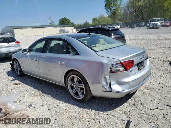 ✅ 2013 Audi A8 3.0L • VIN: WAURGAFD8DN031795 • Lot: 52933365. Listed on Copart with 100,742 mi. Free auction sales archive from the USA and detailed vehicle history report at DreamBid. Image 2.