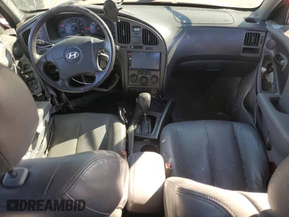 2004 Hyundai Elantra GLS z VIN KMHDN46D24U752362, wystawiony jako Copart lot #81528944 z przebiegiem 157 830 mil mil oraz Szkoda całkowita • Salvage title. Historia ofert i sprzedaży dostępna na DreamBid. Obrazek 8.