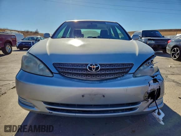 ✅ 2004 Toyota Camry LE • VIN: JTDBE32K940247369 • Lot: 94476305. Wystawiony na Copart z przebiegiem 176 333 mil. Bezpłatny archiwum sprzedaży aukcyjnych z USA i szczegółowy raport historii pojazdu na DreamBid. Zdjęcie 5.
