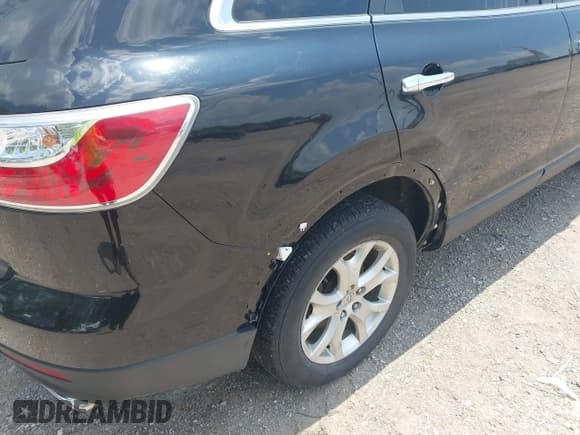 ✅ 2012 Mazda CX-9 Grand Touring • VIN: JM3TB3DA7C0348806 • Lot: 42608518. Listed on IAAI with 229,337 mi. Free auction sales archive from the USA and detailed vehicle history report at DreamBid. Image 13.