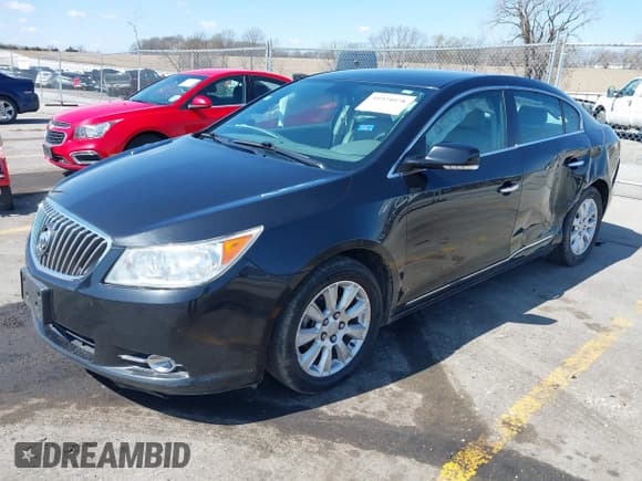 ✅ 2013 Buick LaCrosse Leather • VIN: 1G4GC5ER4DF256294 • Lot: 41924078. Listed on IAAI with 158,402 mi. Free auction sales archive from the USA and detailed vehicle history report at DreamBid. Image 2.