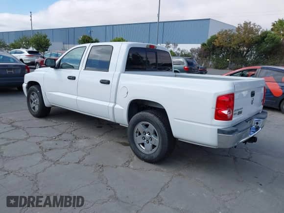 2006 Dodge Dakota SLT with VIN 1D7HE48N26S698223, listed as a IAAI auction lot 42586220 with 100,548 mi miles and . Bid and sale history available at DreamBid. Image 3.