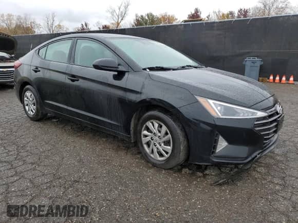 2020 Hyundai Elantra SE z VIN KMHD74LF0LU965079, wystawiony jako Copart lot #90737525 z przebiegiem 125 870 mil mil oraz Czysty tytuł • Clean title. Historia ofert i sprzedaży dostępna na DreamBid. Obrazek 4.