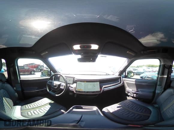 ✅ 2022 Rivian R1T Adventure • VIN: 7FCTGAAA6NN015709 • Lot: 43093648. Listed on IAAI with 22,004 mi. Free auction sales archive from the USA and detailed vehicle history report at DreamBid. Image 24.