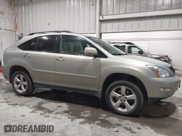 ✅ 2009 Lexus RX 350 • VIN: 2T2HK31U79C106704 • Лот: 43485646. Опубликован ранее на IAAI с пробегом 155 277 миль. Бесплатный доступ к архиву аукционных продаж из США и подробный отчёт об истории автомобиля на DreamBid. Изображение 13.