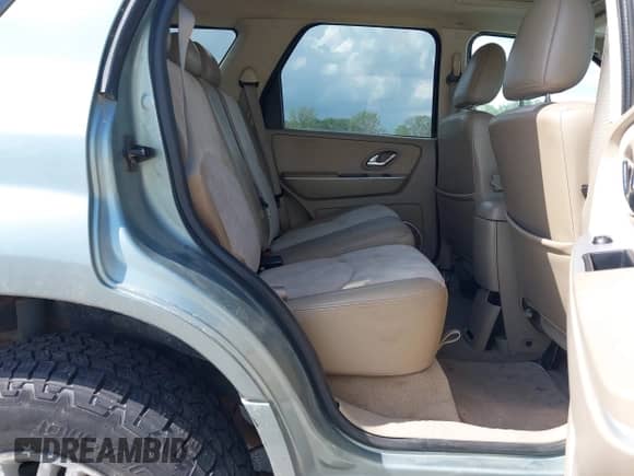 2006 Mercury Mariner Luxury с VIN 4M2CU57196KJ06015, выставлен на аукционе IAAI как лот 42579940 с пробегом 207 529 миль миль и . История ставок и продаж доступна на DreamBid. Изображение 8.