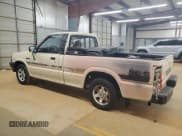 ✅ 1987 Mazda B-Series SE5 • VIN: JM2UF1113H0571194 • Лот: 62510865. Опубликован ранее на Copart с пробегом 138 695 миль. Бесплатный доступ к архиву аукционных продаж из США и подробный отчёт об истории автомобиля на DreamBid. Изображение 2.