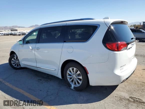 ✅ 2018 Chrysler Pacifica Touring L • VIN: 2C4RC1BG5JR305662 • Lot: 84761415. Listed on Copart with 125,551 mi. Free auction sales archive from the USA and detailed vehicle history report at DreamBid. Image 2.