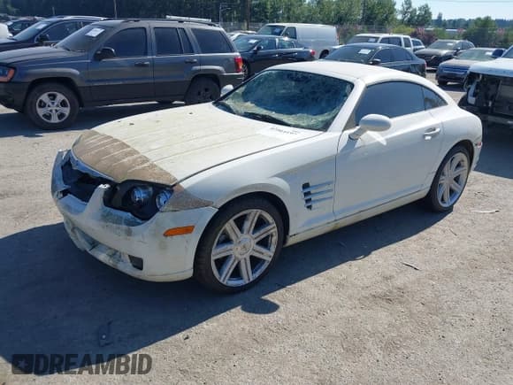 ✅ 2004 Chrysler Crossfire • VIN: 1C3AN69L94X000716 • Lot: 42464197. Listed on IAAI with Not provided. Free auction sales archive from the USA and detailed vehicle history report at DreamBid. Image 2.