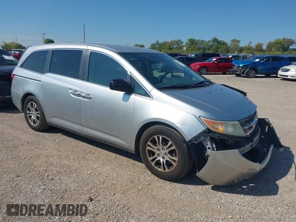 ✅ 2013 Honda Odyssey EX • VIN: 5FNRL5H4XDB055890 • Lot: 43224092. Listed on IAAI with 150,254 mi. Free auction sales archive from the USA and detailed vehicle history report at DreamBid. Image 1.