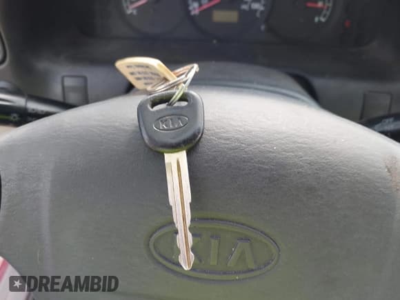 ✅ 2003 Kia Spectra • VIN: KNAFB121535289977 • Lot: 42969388. Listed on IAAI with 59,372 mi. Free auction sales archive from the USA and detailed vehicle history report at DreamBid. Image 11.