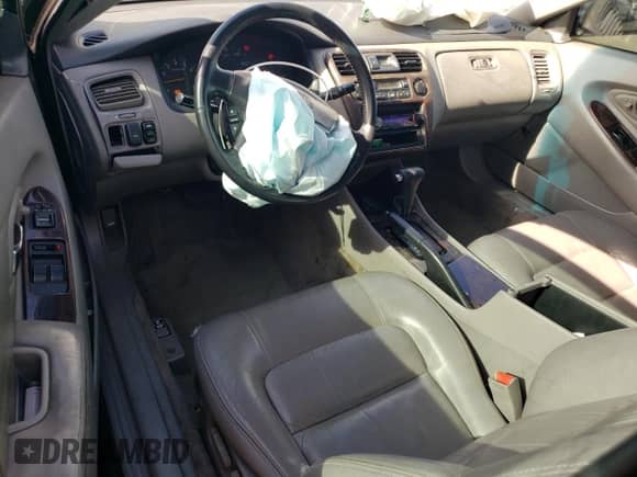 1999 Honda Accord EX с VIN 1HGCG2255XA026290, выставлен на аукционе Copart как лот 89695325 с пробегом 189 230 миль миль и Списание • Salvage title. История ставок и продаж доступна на DreamBid. Изображение 8.