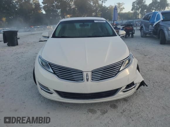 ✅ 2013 Lincoln MKZ • VIN: 3LN6L2J97DR802458 • Lot: 71564475. Wystawiony na Copart z przebiegiem 121 483 mil. Bezpłatny archiwum sprzedaży aukcyjnych z USA i szczegółowy raport historii pojazdu na DreamBid. Zdjęcie 5.