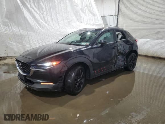 ✅ 2022 Mazda CX-30 2.5 Turbo • VIN: 3MVDMBAY4NM429098 • Lot: 48083005. Listed on Copart with 23,577 mi. Free auction sales archive from the USA and detailed vehicle history report at DreamBid. Image 1.