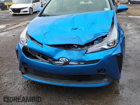 ✅ 2021 Toyota Prius LE • VIN: JTDKAMFU2M3142426 • Lot: 89877445. Listed on Copart with 98,519 mi. Free auction sales archive from the USA and detailed vehicle history report at DreamBid. Image 13.