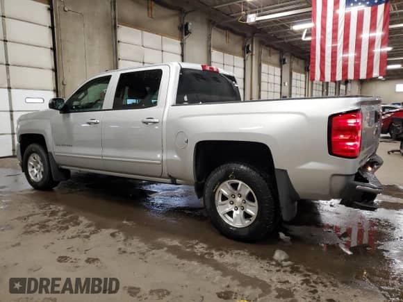 2018 Chevrolet Silverado 1500 LT с VIN 3GCUKRECXJG534137, выставлен на аукционе Copart как лот 78857174 с пробегом 87 590 миль миль и Списание • Salvage title. История ставок и продаж доступна на DreamBid. Изображение 2.