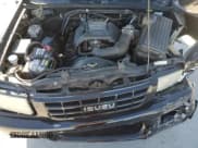 ✅ 1999 Isuzu Rodeo S • VIN: 4S2CK58W2X4336401 • Lot: 83872484. Listed on Copart with 191,278 mi. Free auction sales archive from the USA and detailed vehicle history report at DreamBid. Image 11.