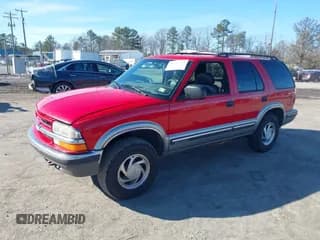 ✅ 1999 Chevrolet Blazer LS • VIN: 1GNDT13W2X2163804 • Lot: 41527624. Wystawiony na IAAI z przebiegiem 185 151 mil. Bezpłatny archiwum sprzedaży aukcyjnych z USA i szczegółowy raport historii pojazdu na DreamBid. Zdjęcie 2.