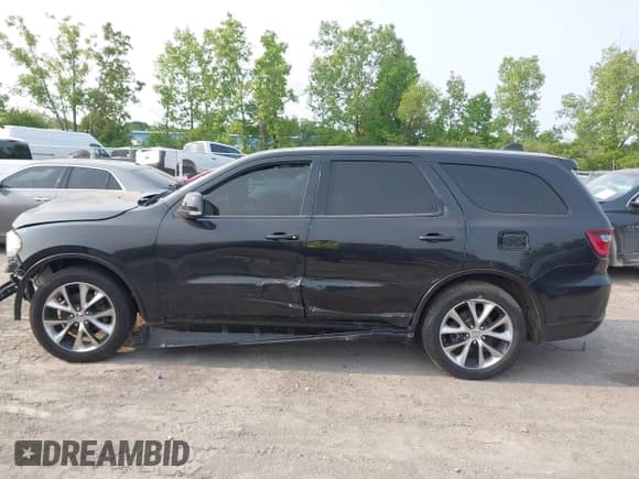 ✅ 2014 Dodge Durango R/T • VIN: 1C4SDHCT4EC513789 • Lot: 42389059. Listed on IAAI with 151,506 mi. Free auction sales archive from the USA and detailed vehicle history report at DreamBid. Image 13.