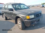 ✅ 1998 Honda Passport LX • VIN: 4S6CM58WXW4403219 • Lot: 42715922. Listed on IAAI with 153,181 mi. Free auction sales archive from the USA and detailed vehicle history report at DreamBid. Image 1.