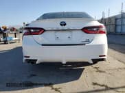 ✅ 2024 Toyota Camry Hybrid SE • VIN: 4T1G31AK0RU076475 • Lot: 82749245. Wystawiony na Copart z przebiegiem 10 497 mil. Bezpłatny archiwum sprzedaży aukcyjnych z USA i szczegółowy raport historii pojazdu na DreamBid. Zdjęcie 6.