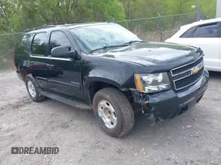 2012 Chevrolet Tahoe LT z VIN 1GNSCBE09CR222631, wystawiony jako IAAI lot #41889997 z przebiegiem 166 138 mil mil oraz . Historia ofert i sprzedaży dostępna na DreamBid. Obrazek 1.