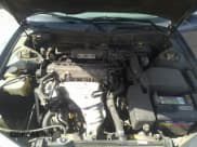 ✅ 1995 Toyota Camry LE • VIN: JT2SK12E8S0323032 • Lot: 32940318. Wystawiony na IAAI z przebiegiem 244 816 mil. Bezpłatny archiwum sprzedaży aukcyjnych z USA i szczegółowy raport historii pojazdu na DreamBid. Zdjęcie 10.