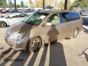 ✅ 2006 Honda Odyssey EX-L • VIN: 5FNRL38696B421587 • Lot: 43681380. Listed on IAAI with 154,494 mi. Free auction sales archive from the USA and detailed vehicle history report at DreamBid. Image 2.