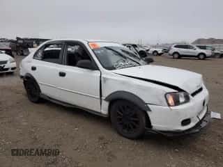 2002 Hyundai Accent GL with VIN KMHCG45C92U271388, listed as a Copart auction lot 85925124 with 98,390 mi miles and Salvage title. Bid and sale history available at DreamBid. Image 4.