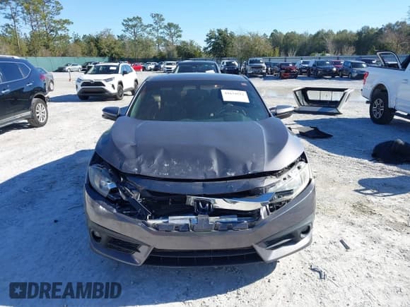 ✅ 2016 Honda Civic EX-L • VIN: 2HGFC3B71GH362214 • Лот: 41634522. Опубликован ранее на IAAI с пробегом 105 118 миль. Бесплатный доступ к архиву аукционных продаж из США и подробный отчёт об истории автомобиля на DreamBid. Изображение 12.