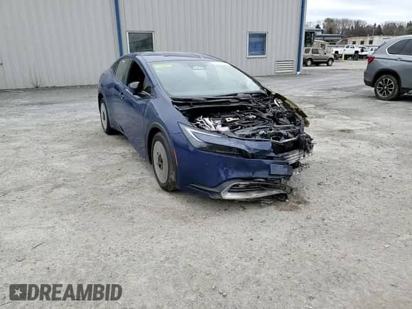 2025 Toyota Prius SE z VIN JTDACACU8S3040893, wystawiony jako Copart lot #52588625 z przebiegiem Nie podano mil oraz Szkoda całkowita • Salvage title. Historia ofert i sprzedaży dostępna na DreamBid. Obrazek 11.