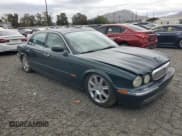 ✅ 2005 Jaguar XJ 8 LWB • VIN: SAJWA79C65SG34572 • Лот: 93790045. Опубликован ранее на Copart с пробегом 148 958 миль. Бесплатный доступ к архиву аукционных продаж из США и подробный отчёт об истории автомобиля на DreamBid. Изображение 4.