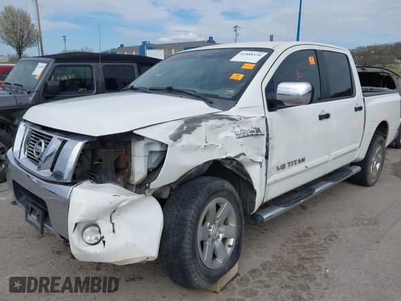 ✅ 2011 Nissan Titan SL • VIN: 1N6AA0EC7BN313599 • Lot: 41888934. Listed on IAAI with 182,894 mi. Free auction sales archive from the USA and detailed vehicle history report at DreamBid. Image 2.