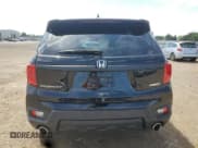 ✅ 2022 Honda Passport EX-L • VIN: 5FNYF8H53NB021918 • Lot: 61624245. Listed on Copart with 10,066 mi. Free auction sales archive from the USA and detailed vehicle history report at DreamBid. Image 6.