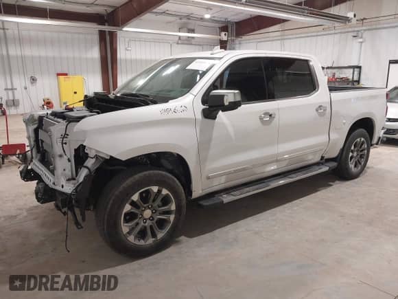 2024 Chevrolet Silverado 1500 High Country with VIN 1GCUDJED3RZ245620, listed as a IAAI auction lot 41969684 with 7,604 mi miles and . Bid and sale history available at DreamBid. Image 2.