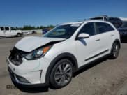 ✅ 2017 Kia Niro Touring • VIN: KNDCE3LC0H5078105 • Lot: 58044655. Listed on Copart with 97,668 mi. Free auction sales archive from the USA and detailed vehicle history report at DreamBid. Image 1.