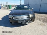 ✅ 2009 Lincoln MKZ • VIN: 3LNHM26T69R627895 • Lot: 43598746. Listed on IAAI with 218,104 mi. Free auction sales archive from the USA and detailed vehicle history report at DreamBid. Image 12.