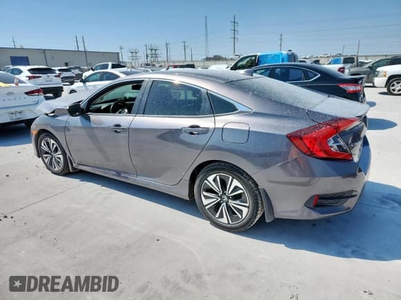 ✅ 2018 Honda Civic EX-L • VIN: JHMFC1F84JX007240 • Лот: 67890125. Опубликован ранее на Copart с пробегом 189 834 миль. Бесплатный доступ к архиву аукционных продаж из США и подробный отчёт об истории автомобиля на DreamBid. Изображение 2.
