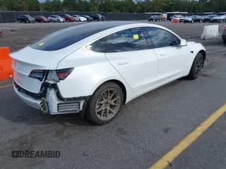 ✅ 2018 Tesla Model 3 Long Range Battery • VIN: 5YJ3E1EA6JF042228 • Lot: 43358814. Listed on IAAI with 96,390 mi. Free auction sales archive from the USA and detailed vehicle history report at DreamBid. Image 4.