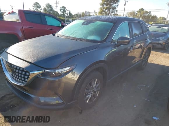 ✅ 2022 Mazda CX-9 Sport • VIN: JM3TCBBY6N0603553 • Lot: 40640259. Wystawiony na IAAI z przebiegiem 19 972 mil. Bezpłatny archiwum sprzedaży aukcyjnych z USA i szczegółowy raport historii pojazdu na DreamBid. Zdjęcie 2.
