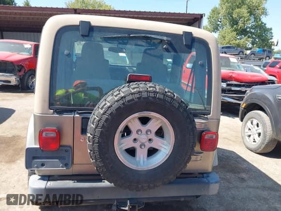 ✅ 2004 Jeep Wrangler Sahara • VIN: 1J4FA59S74P718659 • Lot: 43316154. Listed on IAAI with 144,737 mi. Free auction sales archive from the USA and detailed vehicle history report at DreamBid. Image 16.