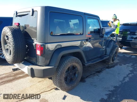 ✅ 2008 Jeep Wrangler X • VIN: 1J4FA24128L515883 • Lot: 43523219. Listed on IAAI with 165,359 mi. Free auction sales archive from the USA and detailed vehicle history report at DreamBid. Image 3.