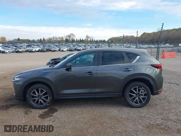 ✅ 2018 Mazda CX-5 Touring • VIN: JM3KFBCM3J0398105 • Lot: 43609194. Wystawiony na IAAI z przebiegiem 64 706 mil. Bezpłatny archiwum sprzedaży aukcyjnych z USA i szczegółowy raport historii pojazdu na DreamBid. Zdjęcie 14.