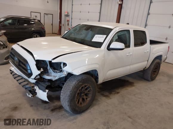 ✅ 2021 Toyota Tacoma SR • VIN: 3TMCZ5ANXMM425335 • Лот: 42764400. Опубликован ранее на IAAI с пробегом 73 631 миль. Бесплатный доступ к архиву аукционных продаж из США и подробный отчёт об истории автомобиля на DreamBid. Изображение 2.