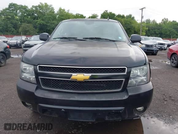 2014 Chevrolet Suburban LT z VIN 1GNSKJE74ER122546, wystawiony jako IAAI lot #42641722 z przebiegiem 435 000 mil mil oraz . Historia ofert i sprzedaży dostępna na DreamBid. Obrazek 12.